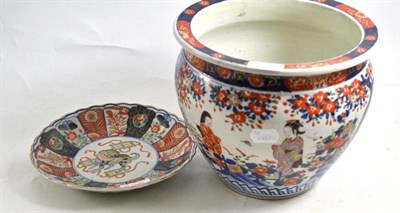 Lot 527 - An Imari jardiniere painted with figure in landscapes and interiors; and a similar fluted...