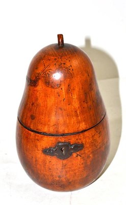 Lot 535 - A George III fruitwood tea caddy, in the form a pear, the hinged cover with stalk, 17cm high