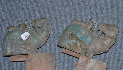 Lot 542 - Two Far Eastern (probably Burmese) wooden carved horse corbels with original blue painted...