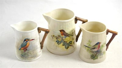 Lot 543 - Three Royal Worcester jugs painted with chaffinch, kingfisher and robin painted by H.Everett,...