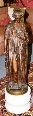 Lot 559 - A bronze figure of Erato, after the Antique, standing wearing flowing robes, a wreath in her...