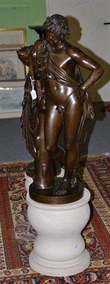 Lot 567 - A 20th century bronze sculpture of a classical male figure, 87cm high, with a modern circular base