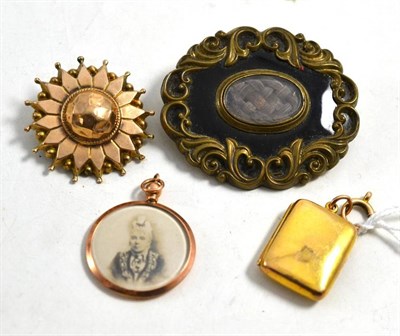 Lot 589 - A Victorian mourning brooch with inlaid plaited hair, a starburst brooch, a 9ct gold oblong...