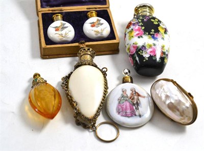 Lot 591 - Eight assorted scent bottles including two in a fitted case, also a mother of pearl pill box