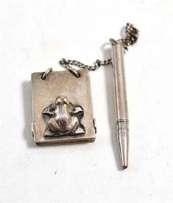 Lot 609 - A Georg Jensen aide memoire, mounted with a frog and an attached propelling pencil, signed...