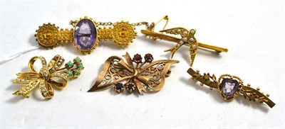 Lot 610 - A 9ct gold garnet brooch, a 9ct gold seed pearl and turquoise brooch, a seed pearl set swallow...