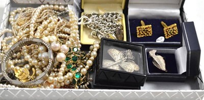 Lot 619 - A mixed lot of jewellery including simulated pearls, silver charm bracelets, a butterfly...