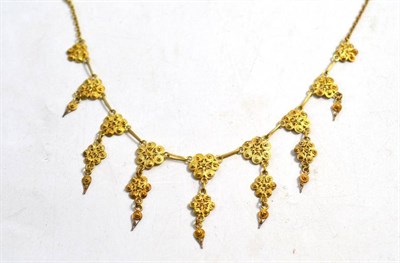 Lot 628 - A fringe necklace, possibly Portuguese, with nine graduated drop forms, in cannetille work,...