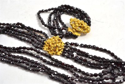 Lot 629 - A Victorian faceted bead necklace, possibly garnet, length (of shortest strand) 38cm and a matching