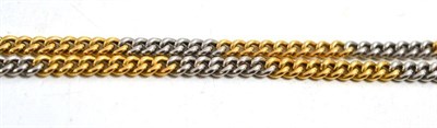 Lot 646 - A two colour watch chain, stamped '18ct', length 38cm