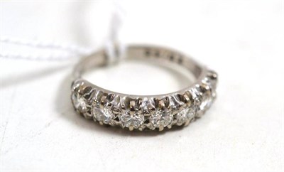 Lot 648 - A diamond half hoop ring, stamped '18ct', total estimated diamond weight 1.00 carat...