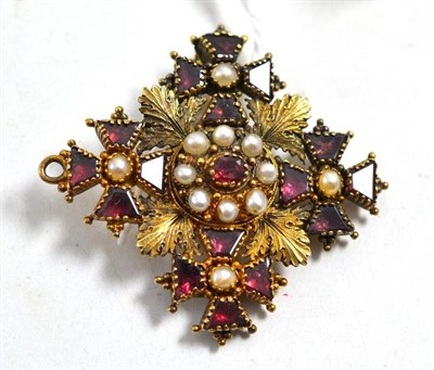 Lot 655 - A foil backed garnet and pearl cruciform brooch/pendant, with a locket back, measures 4cm by 4.3cm