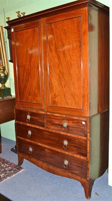 Lot 680 - George III mahogany linen press, interior with hanging space