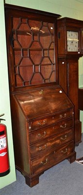 Lot 686 - George III mahogany bureau bookcase of small proportions