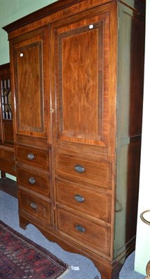 Lot 691 - A 19th century mahogany wardrobe, lined in boxwood and cross-banded in rosewood, with two doors...