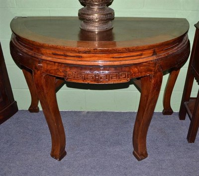 Lot 693 - Chinese demi-lune hardwood table