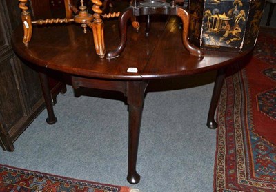 Lot 701 - A mahogany pad foot table