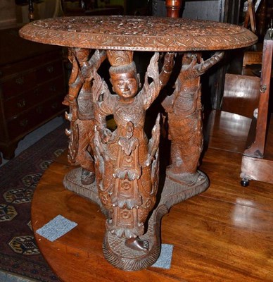 Lot 716 - Burmese carved hardwood centre table