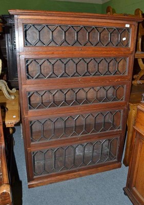 Lot 727 - Oak five sectional bookcase with leaded glass doors