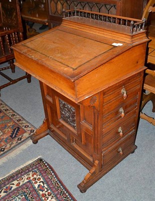 Lot 734 - Late Victorian oak Davenport