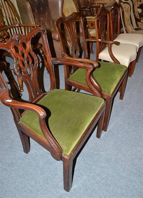 Lot 774 - Two George III mahogany open armchairs and a pair of George III dining chairs with serpentine seats