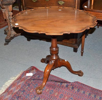 Lot 787 - Mahogany bird cage tripod table