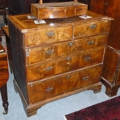 Lot 806 - An early 18th century walnut five drawer straight fronted chest of drawers