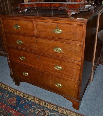 Lot 822 - George III oak five drawer straight fronted chest