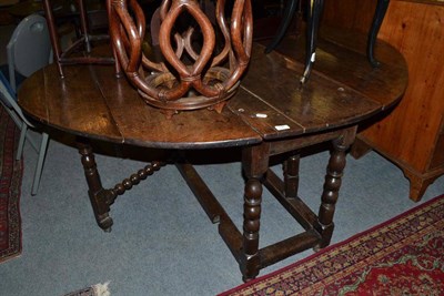 Lot 826 - A late 17th century oak gateleg table on bobbin turned legs