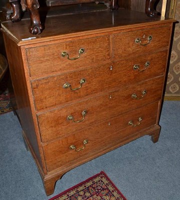 Lot 829 - An oak and pine chest