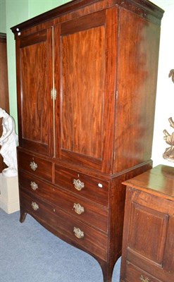 Lot 841 - Late George III mahogany press cupboard with hanging space