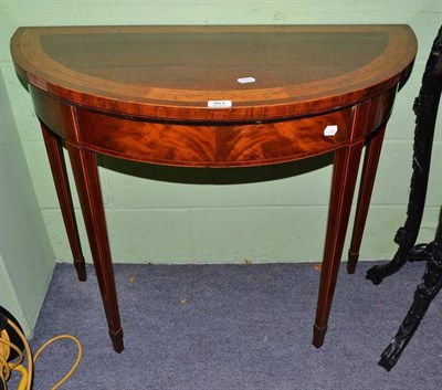 Lot 861 - Mahogany and satinwood banded fold-over card table