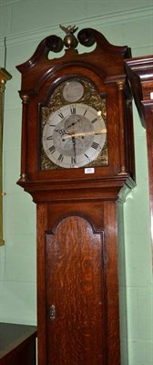 Lot 865 - An oak eight day longcase clock, arch with a silvered plaque bearing inscription Jas Coates,...