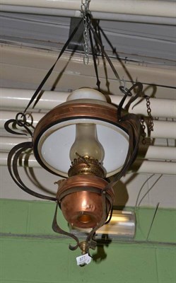 Lot 877 - Arts & Crafts copper and iron hanging oil lamp, complete with chimney