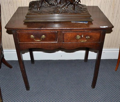 Lot 884 - 18th century oak side table, with re-entrant corners