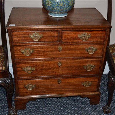 Lot 887 - A mahogany five drawer straight fronted chest of small proportions