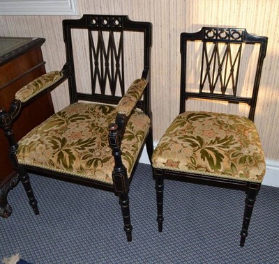 Lot 888 - A late Victorian ebonised and parcel gilt five piece salon suite, circa 1900, covered in green...