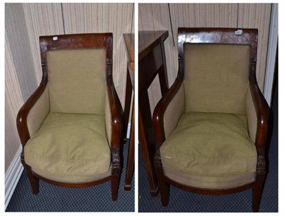 Lot 895 - Pair of French mahogany armchairs after a model by Jacob with dolphin arm supports and short...