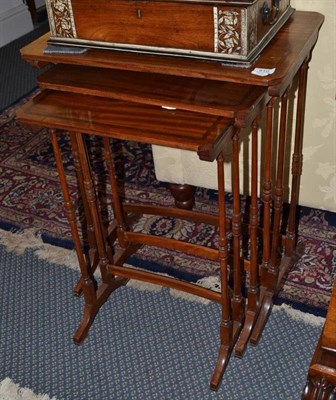 Lot 910 - Set of three satinwood nesting tables