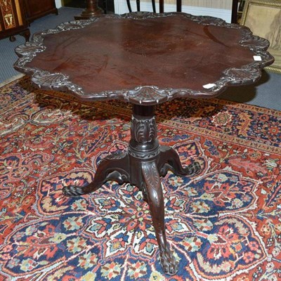 Lot 914 - Irish mahogany Chippendale style tea table