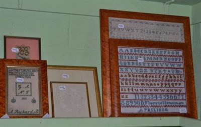 Lot 1011 - A needlepoint alphabet sampler with birds and trees by Maria Walker aged 12, 1833, together...