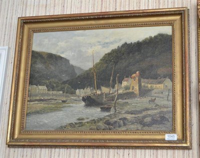 Lot 1045 - W.H Barrow (ex.1888) Boats on an estuary outside a fishing village, signed and dated 1877, oil...