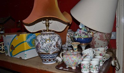 Lot 1221 - Three pottery lamp bases, Staffordshire Chintz wares, a French porcelain flower ornament and...