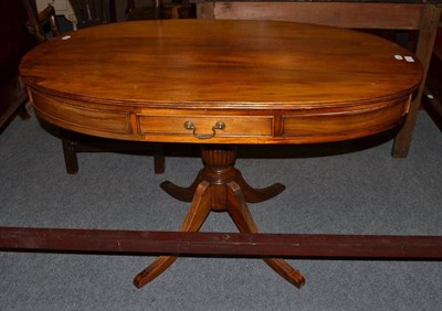 Lot 1227 - A reproduction oval centre table