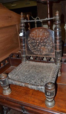 Lot 1229 - Indian low chair