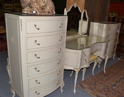 Lot 1249 - A French style cream and gilt painted bedroom suite comprising dressing table and stool, a six...