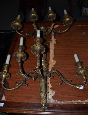 Lot 1268 - A pair of gilt metal four branch wall lights, a pair of Neo-Classical lamp bases and pair of copper