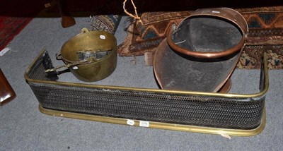 Lot 1276 - A copper coal scuttle, a fender, a jam pan and a chestnut roaster