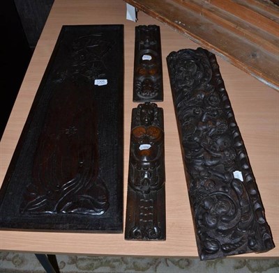 Lot 1305 - Six oak carvings - furniture mounts