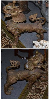 Lot 1326 - Pair of Chinese gilt metal dragons